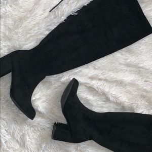Black Over-the-Knee boots.